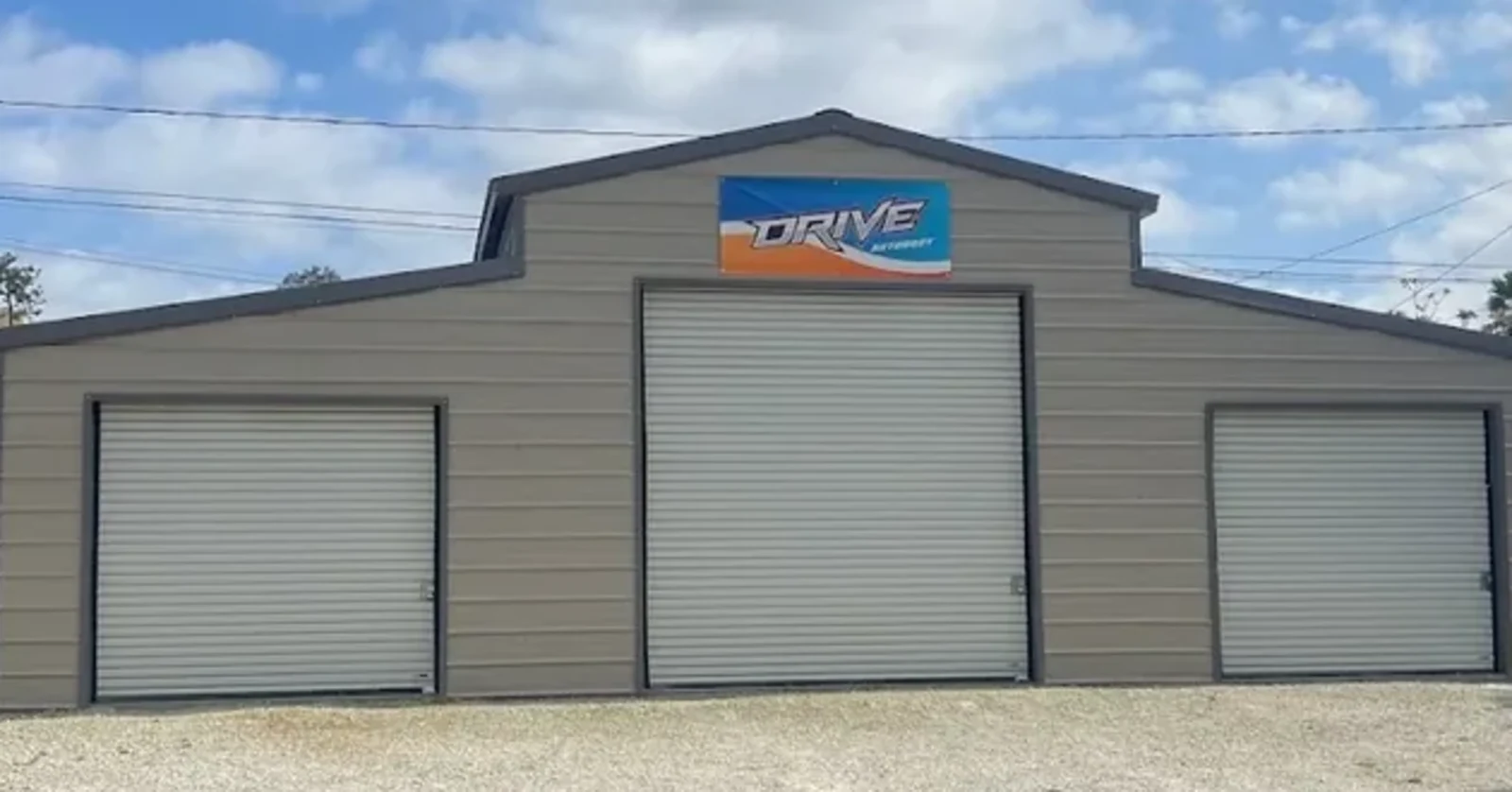 Drive Auto Body's building and sign at the Hemet shop.